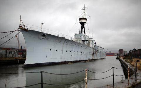 HMS Caroline six months from completion